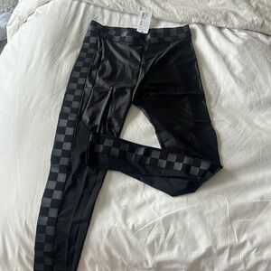 Alala Black Shiny Varsity Leggings with Grey Checkers down Leg, Size M NWT
